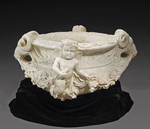 Appraisal: A Baroque style marble fountain basin Carved with ram s