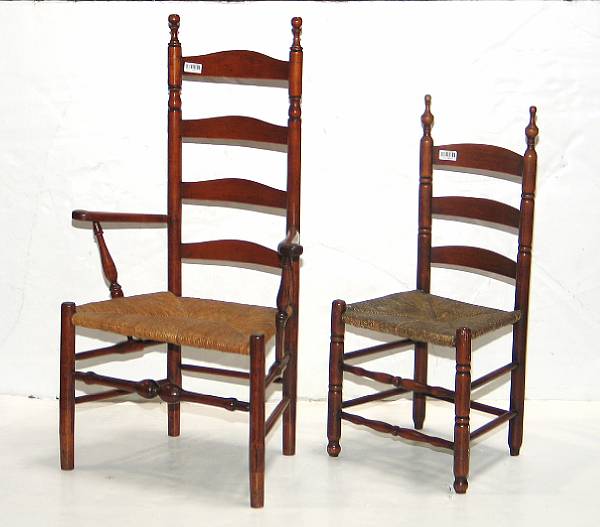 Appraisal: Two American mixed wood ladderback chairs together with a paint