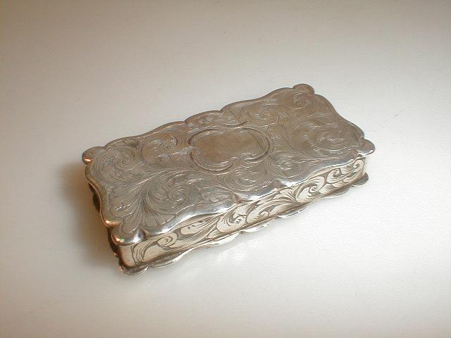 Appraisal: A Victorian silver snuff and vesta case of bracketed rectangular