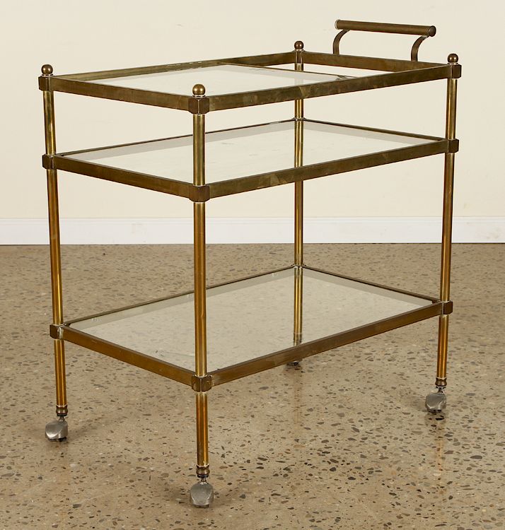 Appraisal: A BRONZE AND GLASS BAR CART CIRCA A bronze and