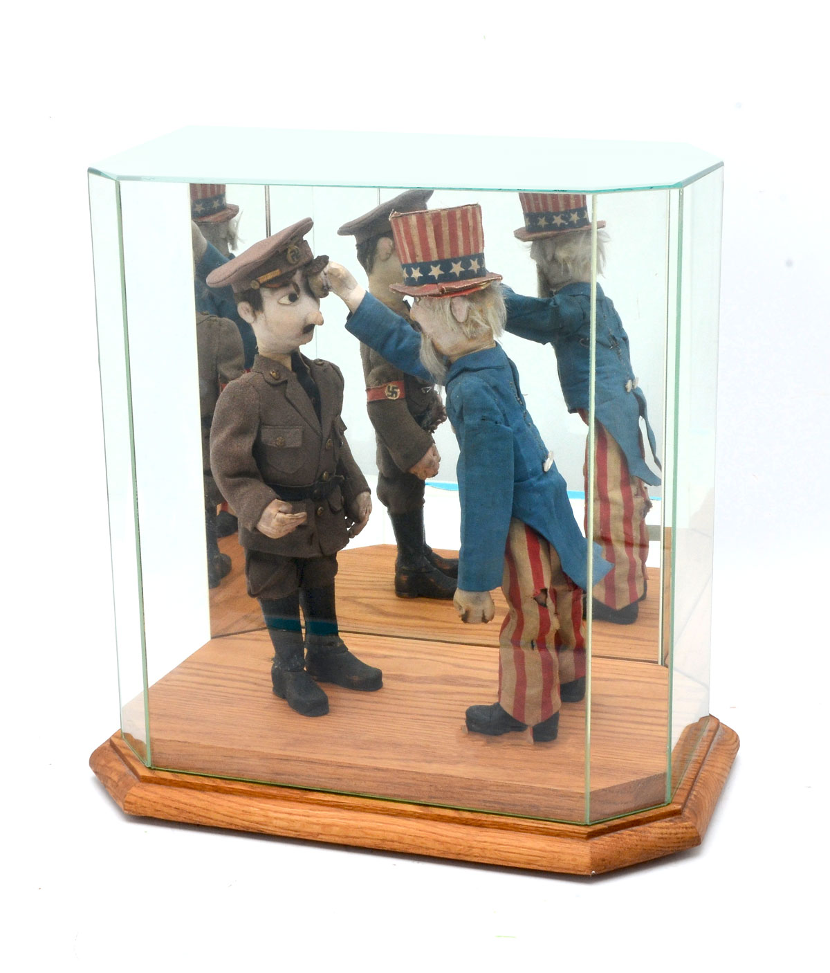 Appraisal: UNCLE SAM AND HITLER FOLK ART World war II cased