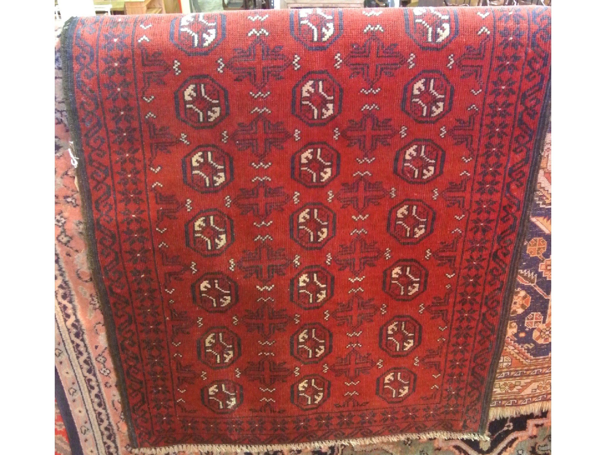 Appraisal: An old Balochi wool work rug the claret red field