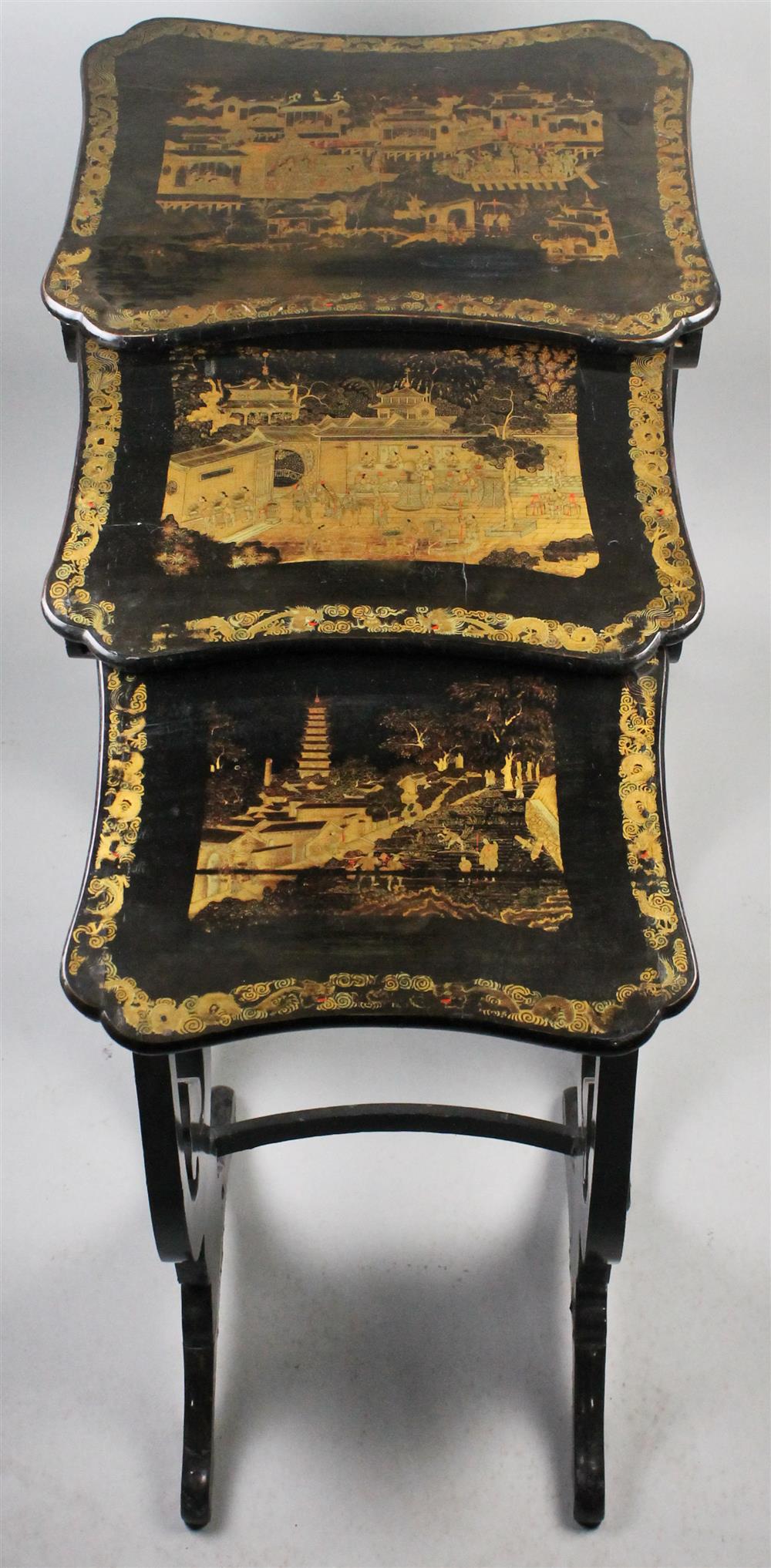 Appraisal: CHINESE EXPORT NEST OF THREE GILT DECORATED BLACK LACQUER TABLES