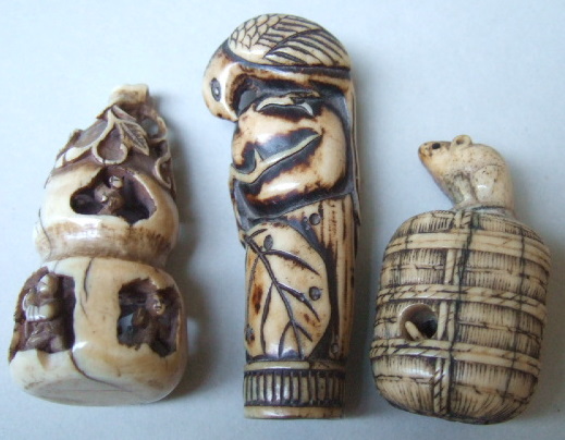 Appraisal: A stag antler netsuke of rats th century carved with