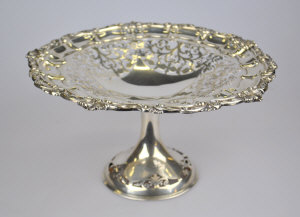 Appraisal: A late Victorian silver comport with shell and scroll rim