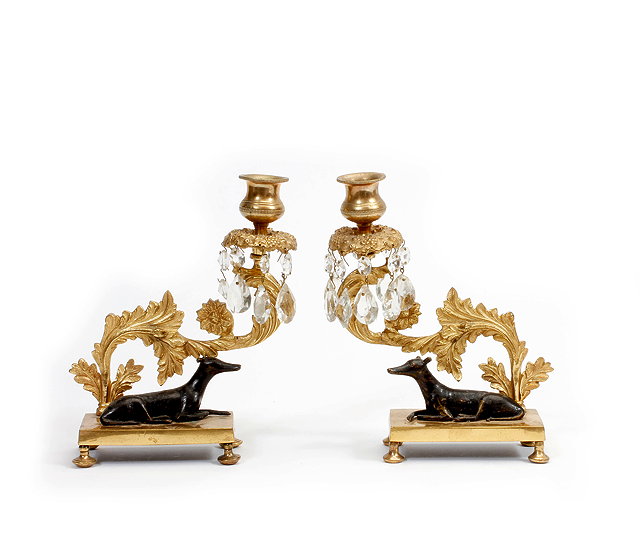 Appraisal: A PAIR OF FRENCH ORMOLU CANDLESTICKS the acanthus leaf carved