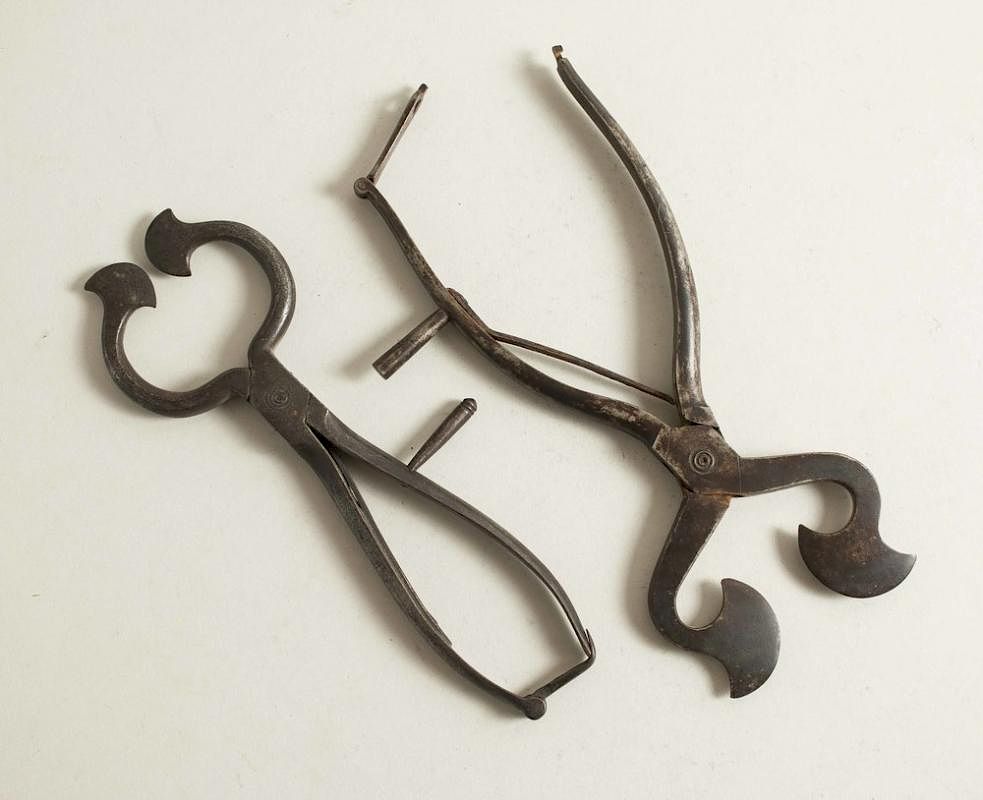 Appraisal: Two English th c Sugar Nippers Two English wrought iron