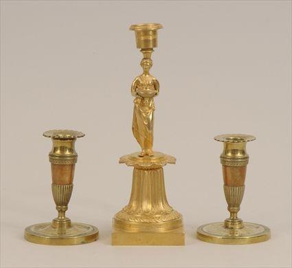 Appraisal: Empire-Style Gilt-Bronze CandlestickTogether with a pair of Empire-style patinated brass