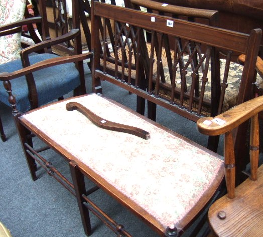 Appraisal: An Edwardian mahogany and line inlaid salon settee with pierced