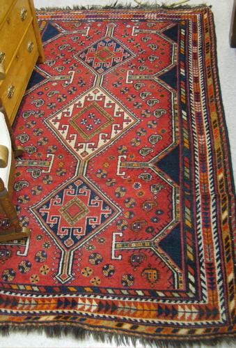 Appraisal: SEMI-ANTIQUE PERSIAN SHIRAZ CARPET the red field centering a column