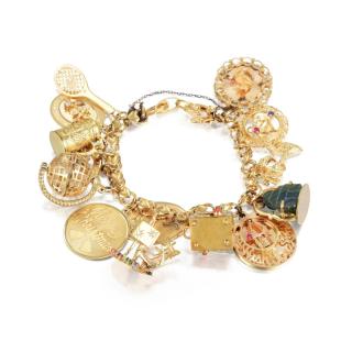 Appraisal: A Gold Charm Bracelet Crafted out of K yellow gold