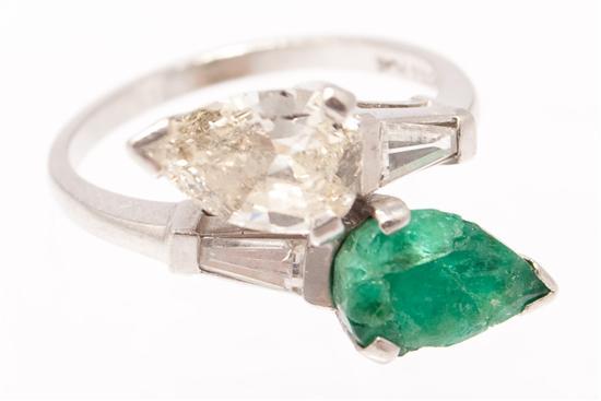 Appraisal: Platinum diamond and emerald ring diamond approximately cts emerald approximately