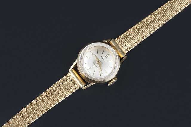 Appraisal: A lady's wristwatch by Heno the circular signed silvered dial