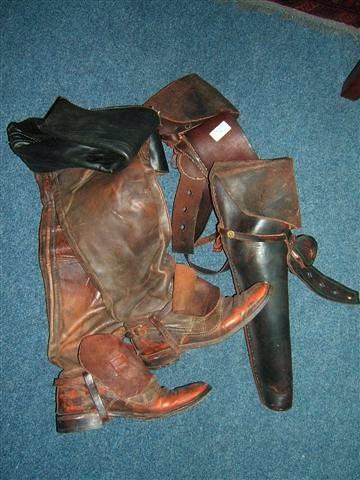 Appraisal: A pair of leather saddle gun holsters and a pair