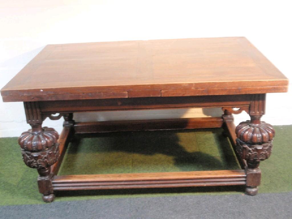 Appraisal: An Elizabethan style oak draw leaf refectory table with carved