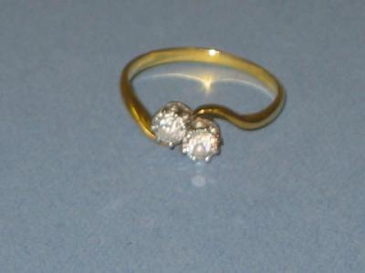 Appraisal: A TWO STONE DIAMOND RING the brilliant cut stones approximately