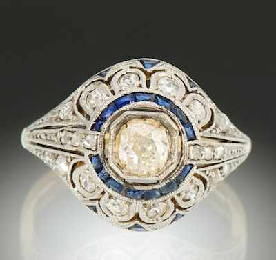 Appraisal: A Platinum Gold Sapphire and Diamond Ring k yellow gold