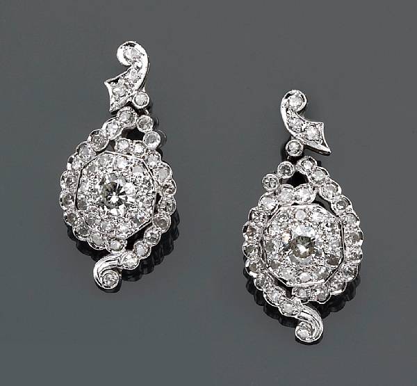 Appraisal: A pair of diamond earrings accompanied by box estimated total