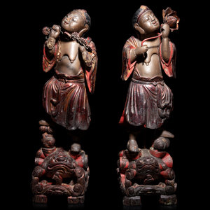 Appraisal: Two Chinese Painted Wood Figures of Immortals TH CENTURY each