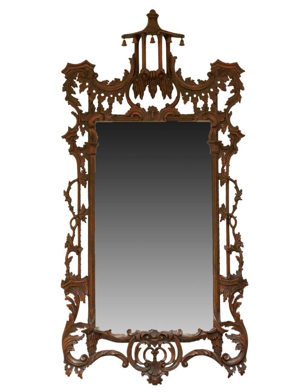 Appraisal: GEORGIAN-STYLE CHINOISERIE CARVED WALNUT WALL MIRRORwith flat mirror plate Condition