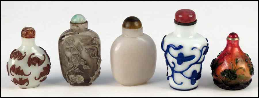 Appraisal: TWO CHINESE PEKING GLASS SNUFF BOTTLES Together with three snuff