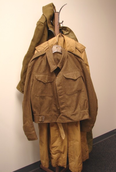 Appraisal: Grouping of World War II period overcoats including Heavy canvas