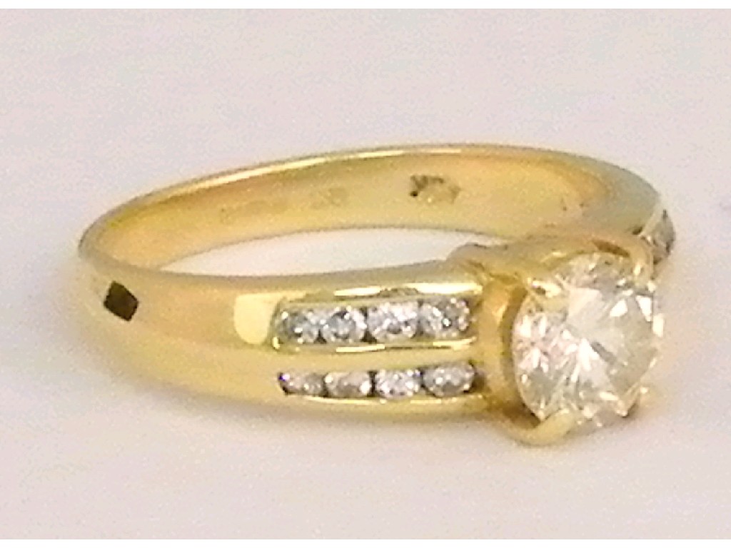 Appraisal: Good ct solitaire diamond ring with diamond set shoulders centre