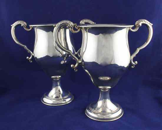 Appraisal: A pair of George V silver two handled trophy cups