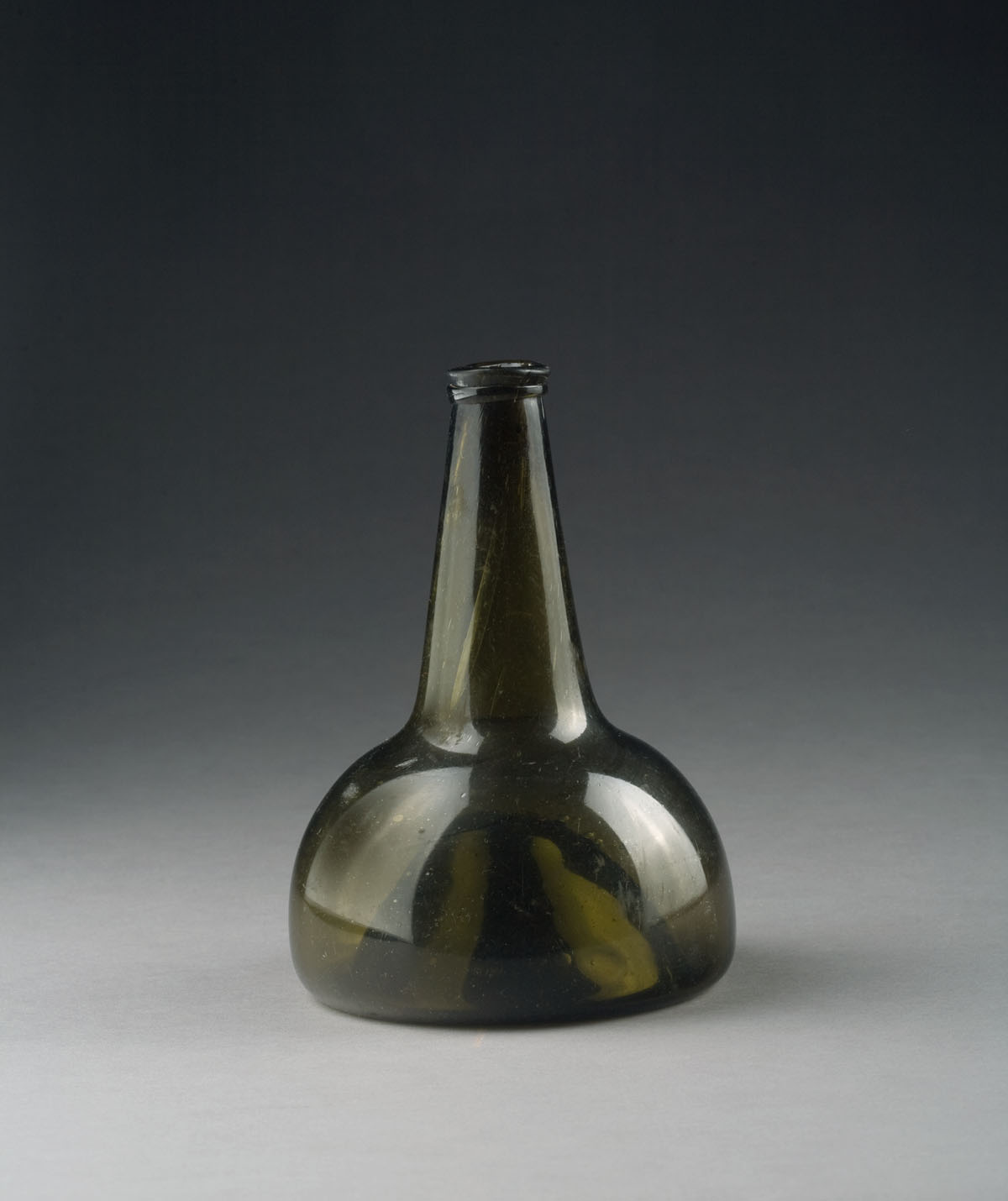 Appraisal: OLIVE AMBER SQUAT BOTTLE Height inches