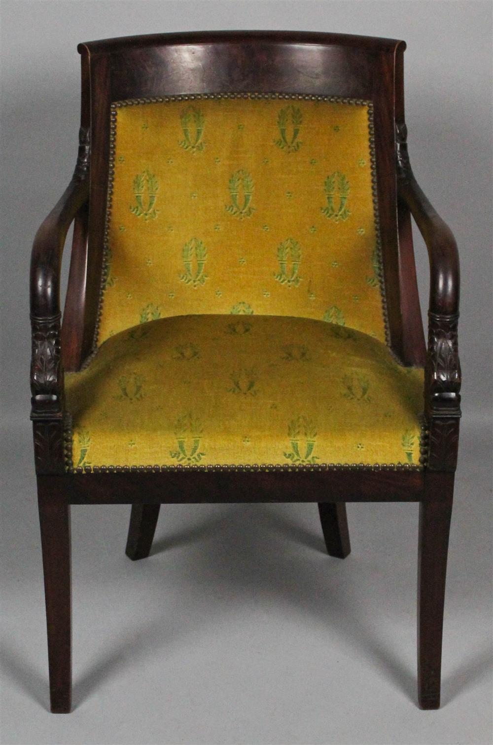 Appraisal: EMPIRE STYLE MAHOGANY FAUTEUIL WITH DOLPHIN MOTIF upholstered in olive