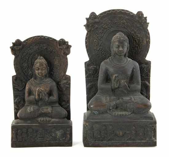 Appraisal: Asian bronze Buddha figures on thrones probably Qing dynasty in