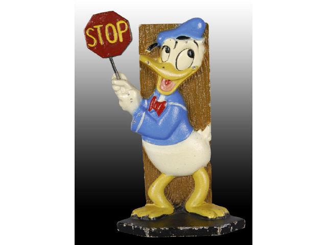 Appraisal: Donald Duck Stop Enter Cast Iron Doorstop Description The sign