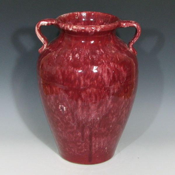 Appraisal: McCoy handled oil jar in red Unmarked Excellent condition tall