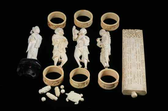 Appraisal: FOUR CHINESE IVORY FIGURES OF IMMORTALS Together with six napkin