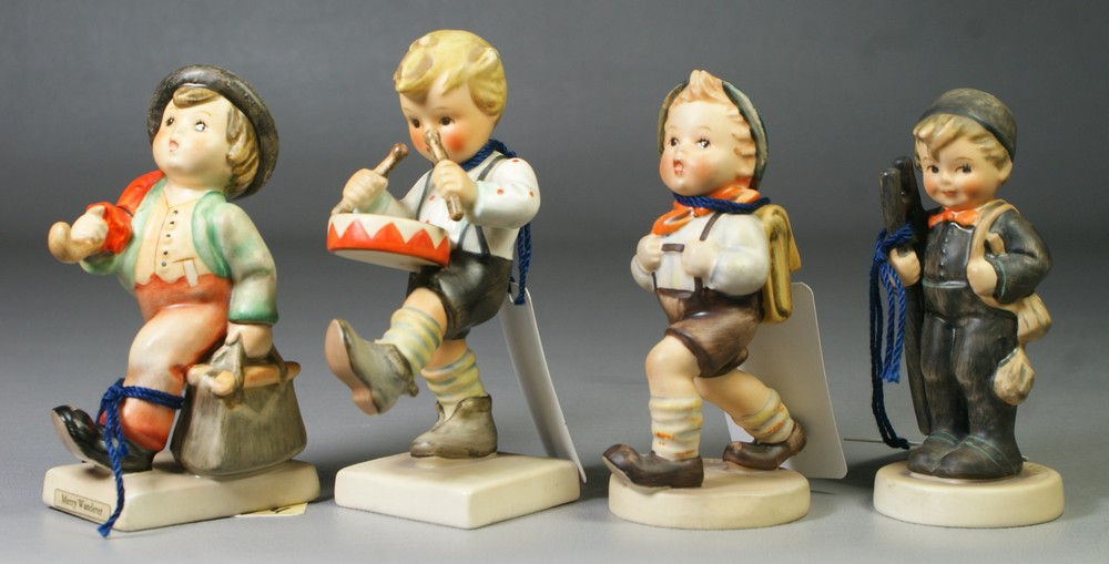 Appraisal: Hummel figurines School Boy Hum some crazing Merry Wanderer Hum