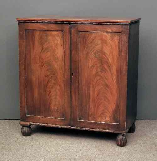 Appraisal: A George IV collector's mahogany cabinet the plain top with