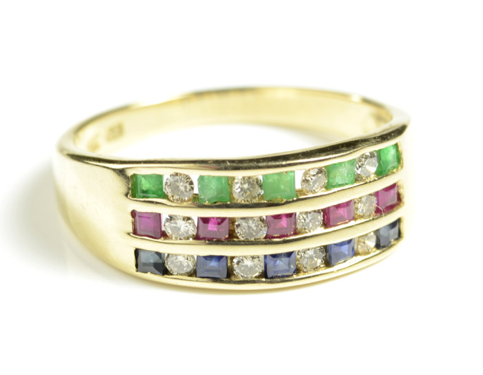 Appraisal: EMERALD SAPPHIRE RUBY AND DIAMOND RING k yellow gold set