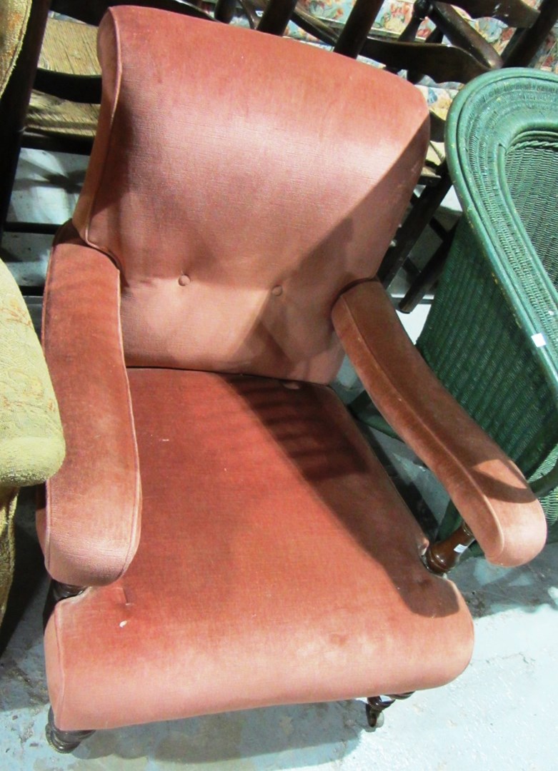 Appraisal: A th century walnut framed pink upholstered armchair