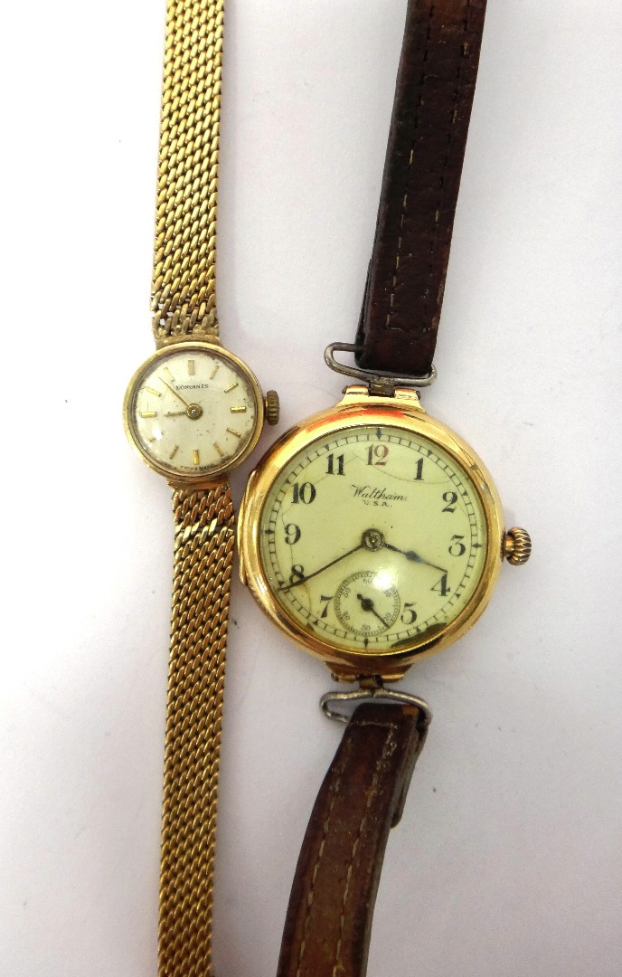 Appraisal: A ct gold circular cased lady's Waltham wristwatch the signed