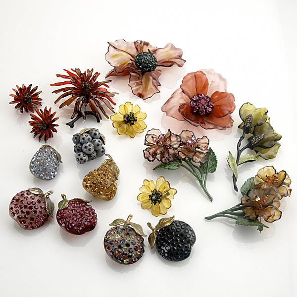 Appraisal: COLORFUL RESIN OR LUCITE JEWELRY Seventeen pieces include brooches and