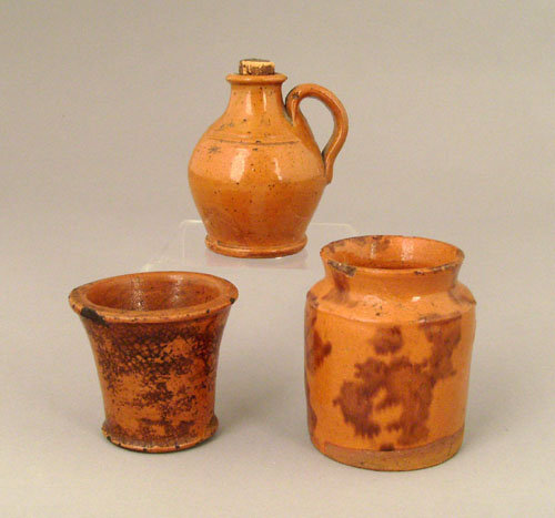 Appraisal: Two miniature redware crocks th c tallest - h together