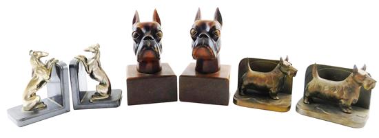 Appraisal: Three pairs th C dog-themed bookends pair of carved wooden