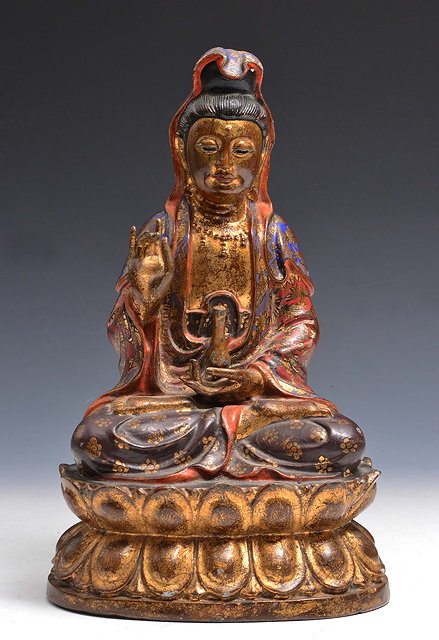 Appraisal: A CHINESE PAINTED METAL POSSIBLY BRONZE SEATED MODEL OF QUANYIN