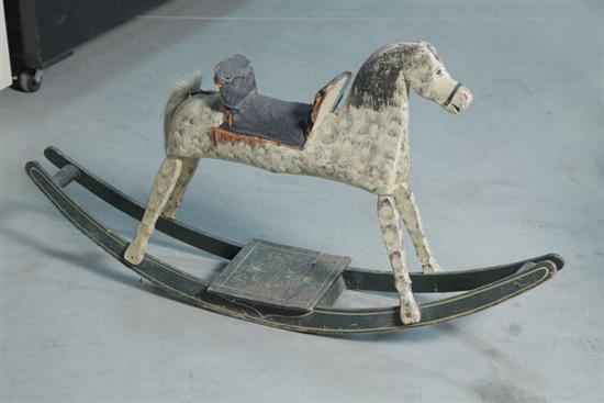 Appraisal: ROCKING HORSE Folksy carved and polychrome painted rocking horse with