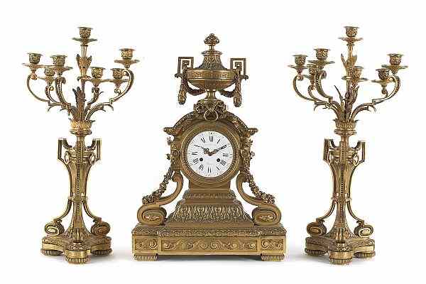 Appraisal: Massive Napoleon III gilt bronze clock garniture ca by Raingo