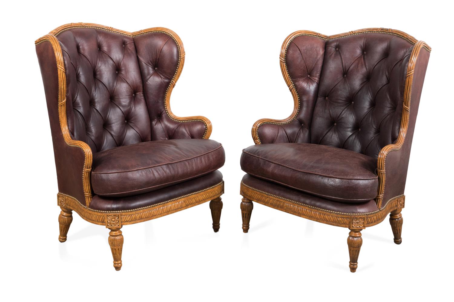 Appraisal: PAIR MAITLAND-SMITH OVERSIZED LEATHER WING CHAIRS Pair of Maitland-Smith oversized