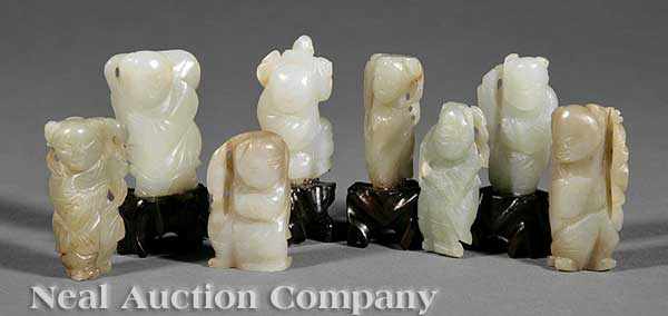 Appraisal: A Group of Eight Chinese Carved Jade Figures each celadon