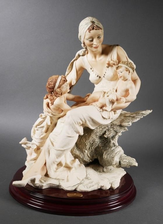 Appraisal: Pride and Joy sculpture by Giuseppe Armani Figurine measures approx