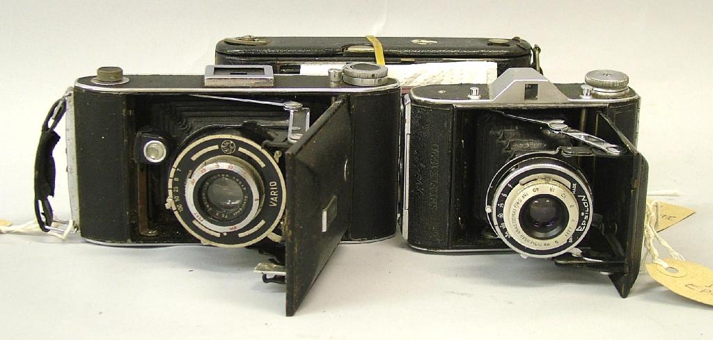 Appraisal: Three Ensign cameras 'Regular' folding roller film plate camera with