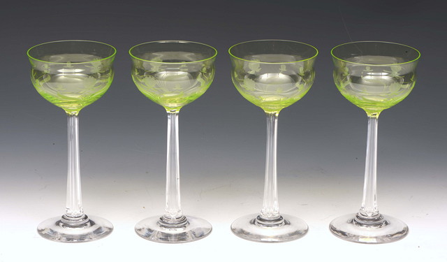 Appraisal: A set of four Art Nouveau drinking glasses engraved sinuous